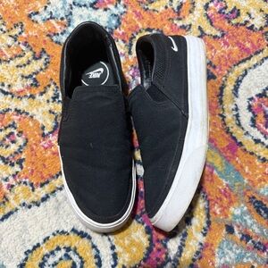 Nike Black Canvas Slip-Ons with White Sole